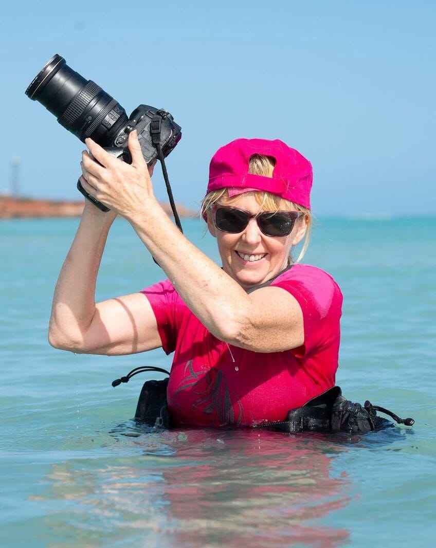 Sharon Lee Chapman photographing on location